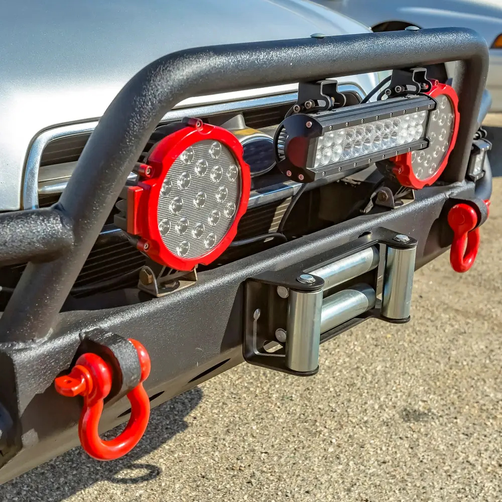 Large Bumper Guard: Grille guard with spotlights and round tow hook