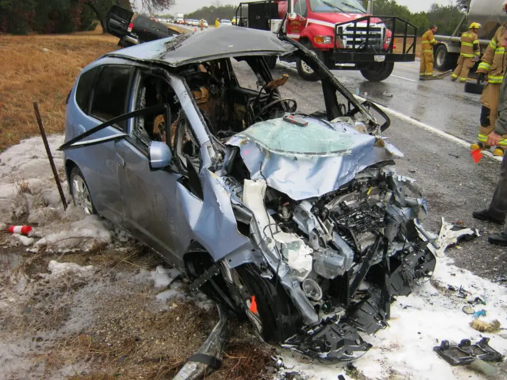 John Eagle Collision Center Accused of Gluing on Honda Fit Roof Causing Driver to Burn in Car Accident