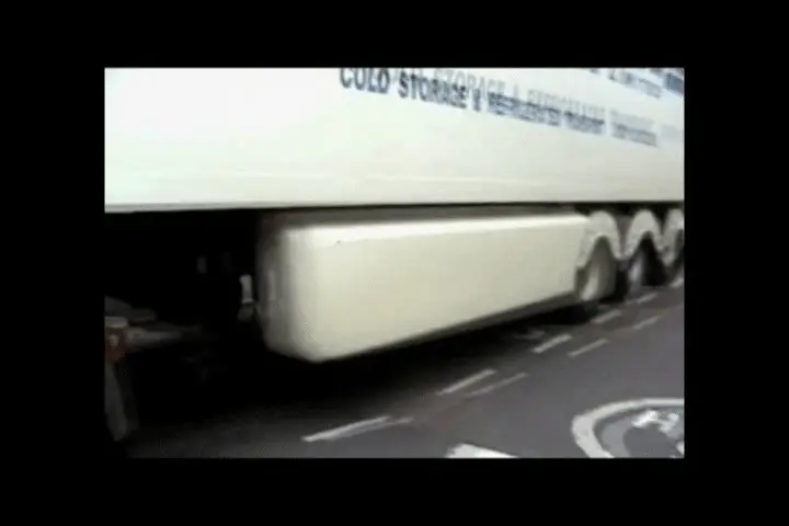 European 18-wheeler trailer outfitted with override barriers from the Tracy Law Firm