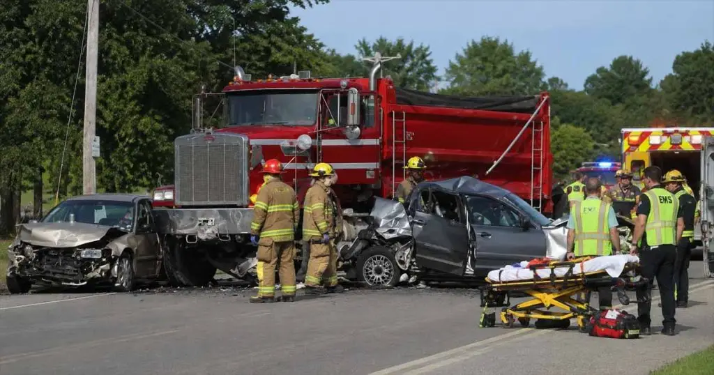 Semi-Truck Crashes Into Two Passenger Cars